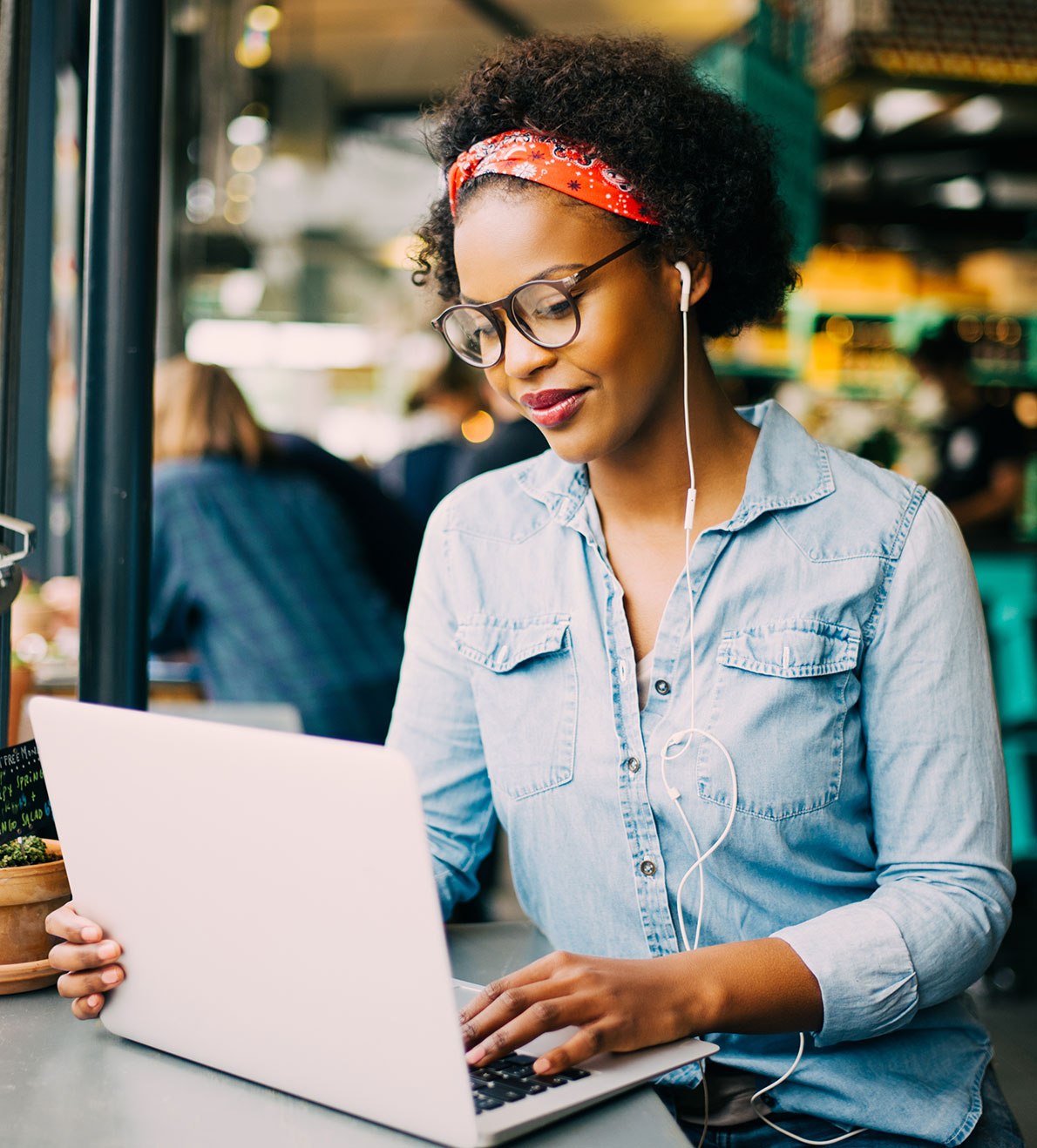 Woman in coffee shop on computer info-1
